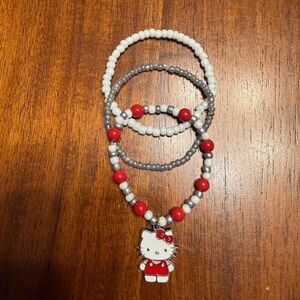 Hello Kitty Red, White, and Silver Beaded Bracelet Trio